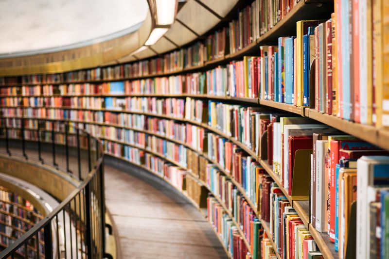 circular wall full of shelves stacked with books