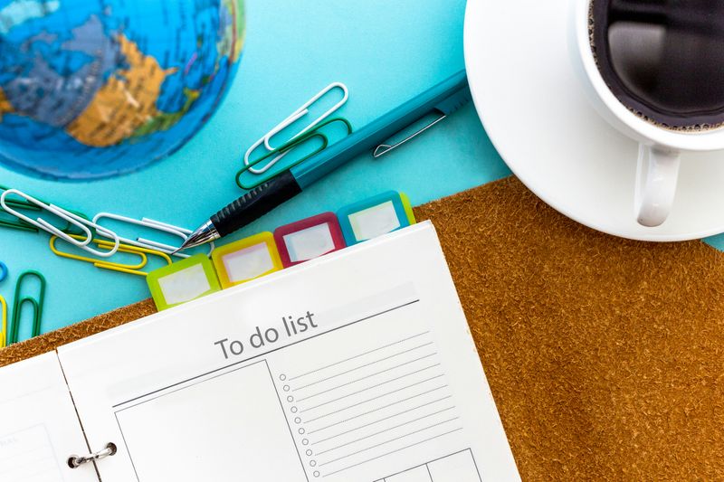 A planner on a desk open to a 'to do list' page.