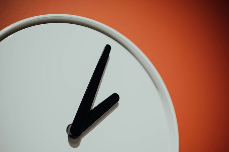 A close up of clock hands.