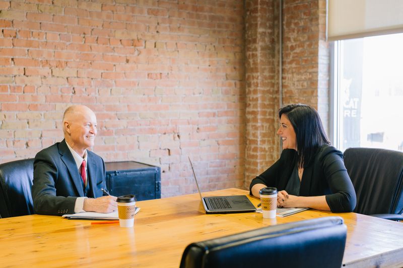 Two business people having a meeting