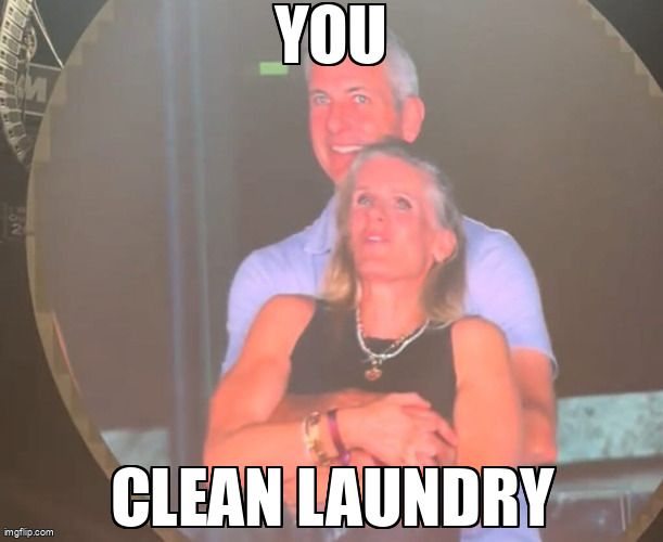 The Coldplay kiss cam meme. A man labelled 