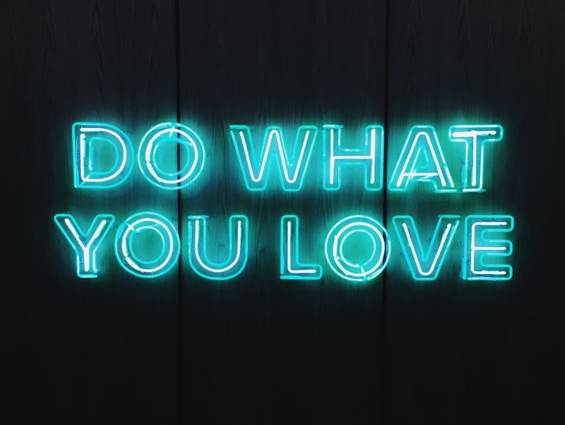 A neon sign that reads, 'Do what you love'.