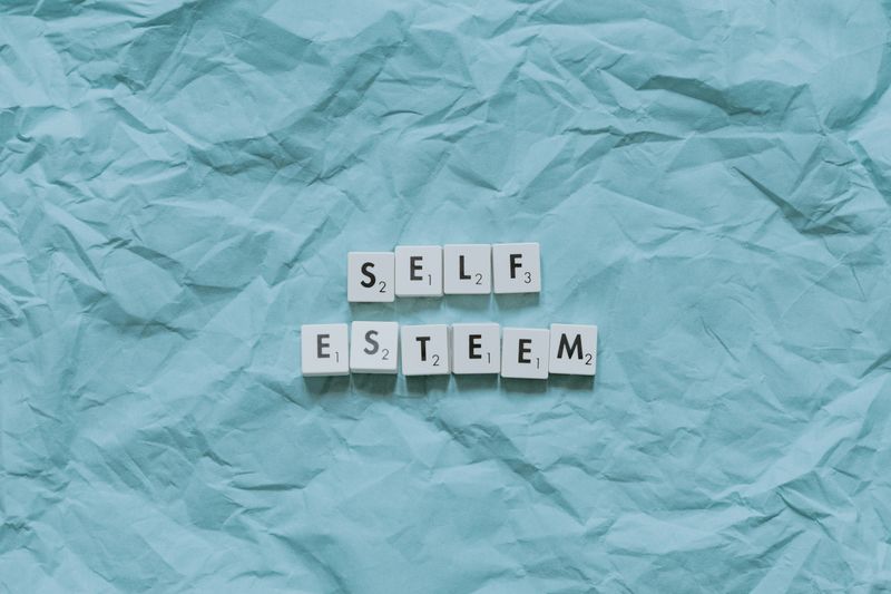 Scrabble letters spelling out Self Esteem