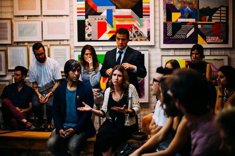 A group of people having a discussion 