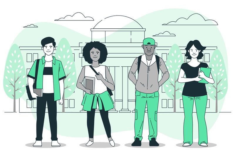 Four young BIPOC smiling teenage students in front of school building and trees. They're holding bags or books and standing. 