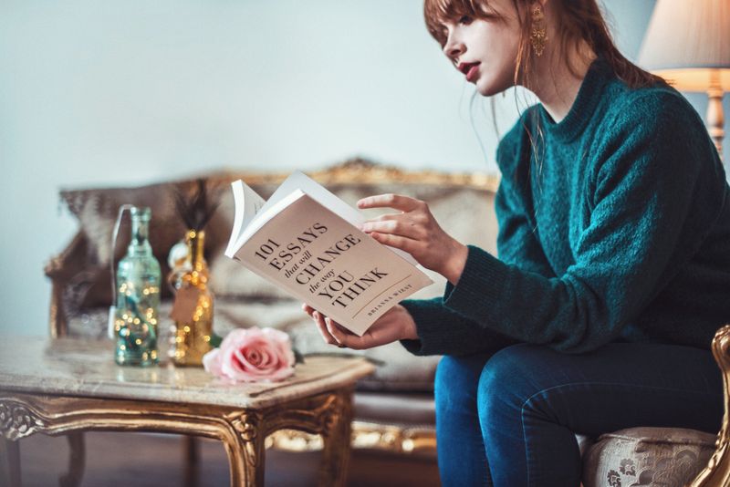 A woman reading a book.