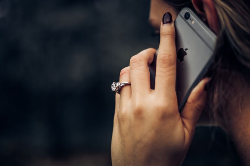 A woman holding a phone