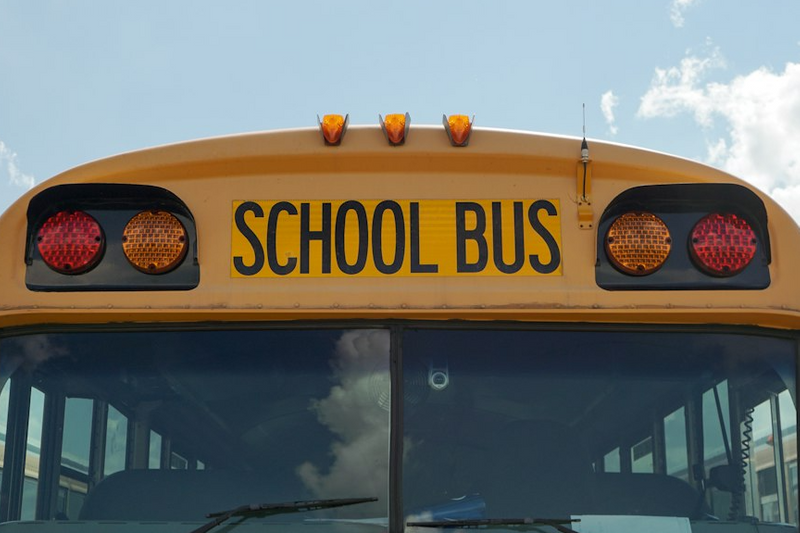 The front of a parked school bus.