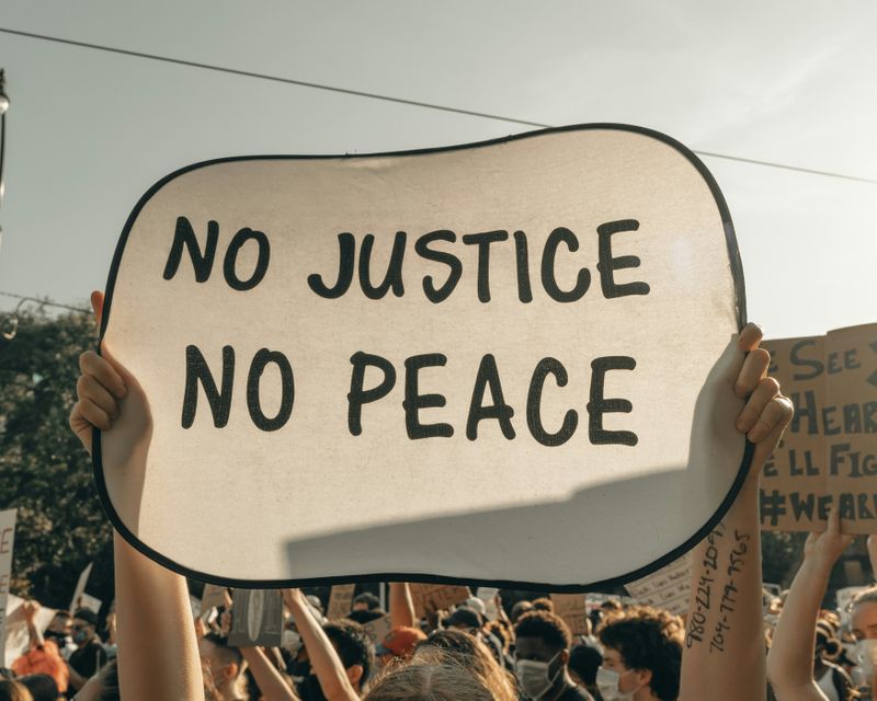 A sign at a protest that reads: 