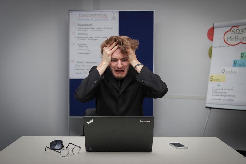 Frustrated man at computer