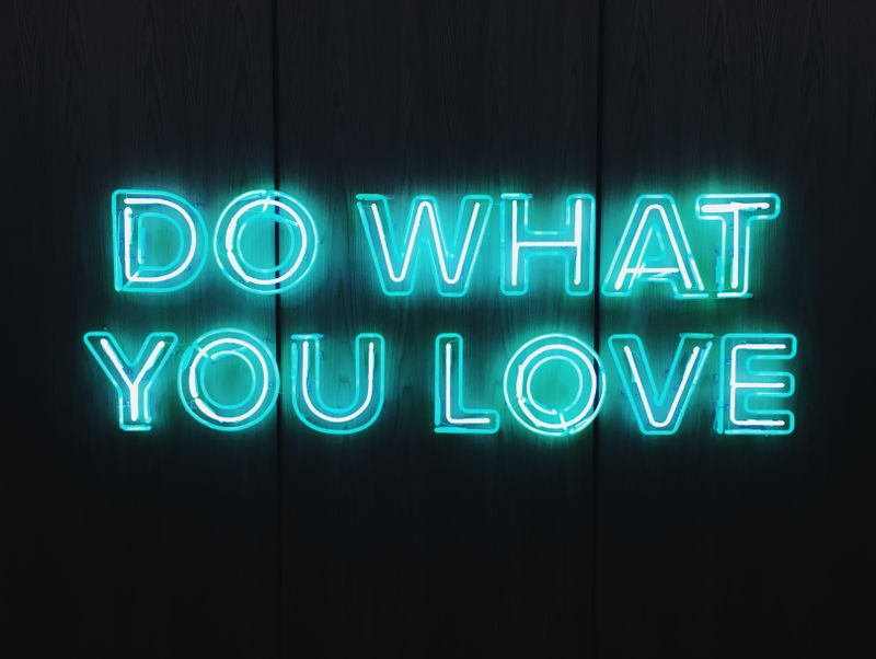 A neon light display that reads, 'Do what you love.'