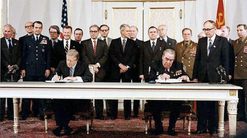 US & Soviet leaders signing the SALT II treaty.