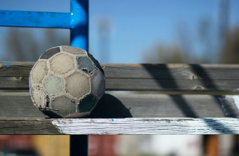 A football that has been well-played with.