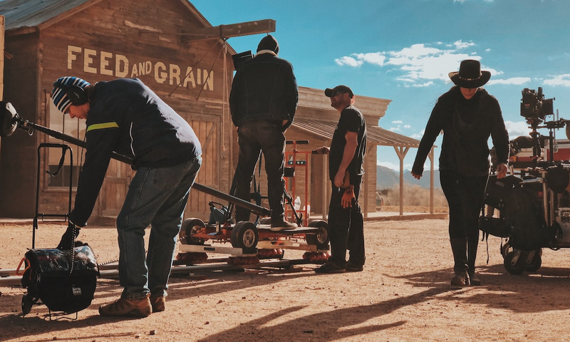 Film set in dusty old western town during the day