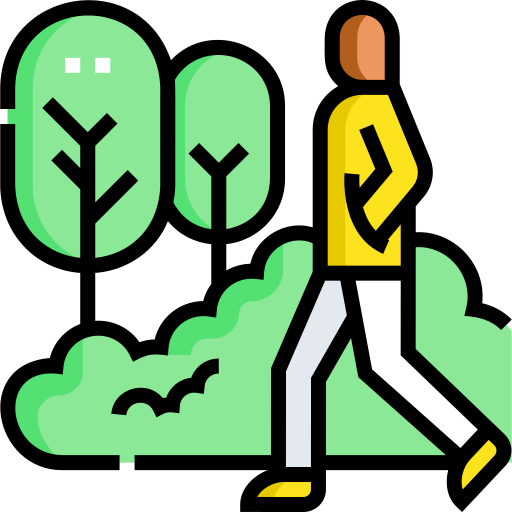 An icon of a person walking through a forest.