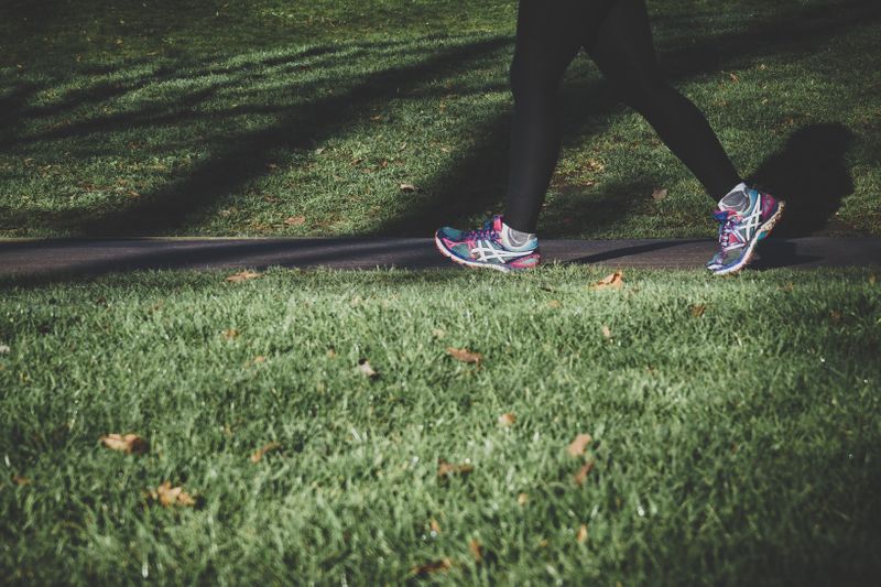 A person walking on a park path