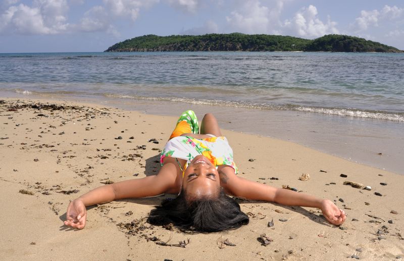 Woman laying in the sun 