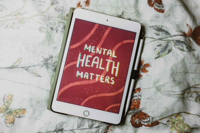 An ipad showing a graphic that reads, 'Mental health matters'.