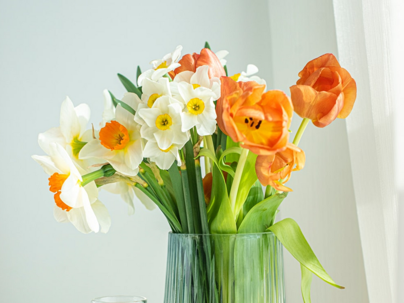 A bouquet of orange and yellow flowers