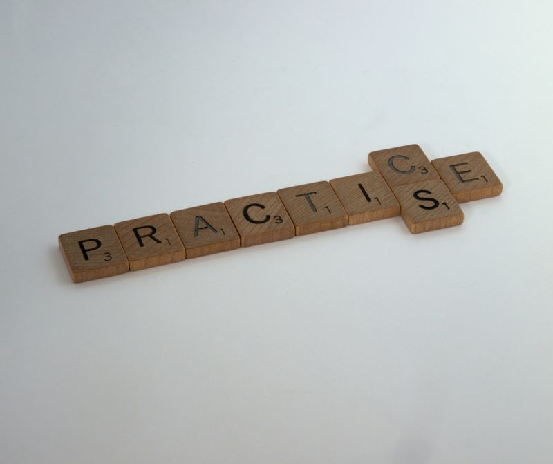 Practice spelled with a 'c' and an 's' in Scrabble tiles.