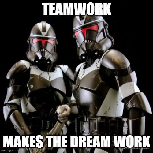 Two clones look at the camera. The caption reads, 'Teamwork makes the dream work.'