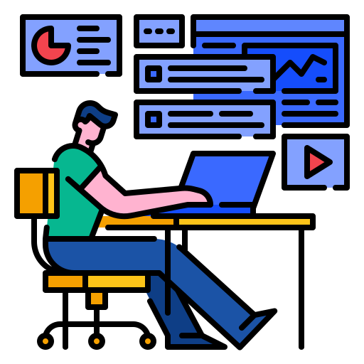 person working at a computer creating graphs and charts