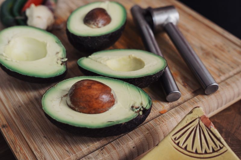 Fresh cut avocados (Photo by Conscious Design on Unsplash)