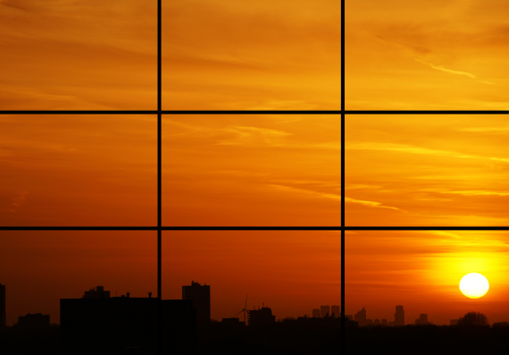 An image showing rule of thirds with a sunset visible at the bottom right side of image.