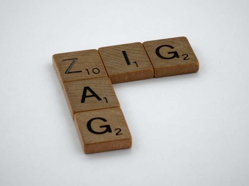 Scrabble tiles that spell the words 'zig' and 'zag'