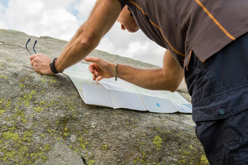 A man looking at a map