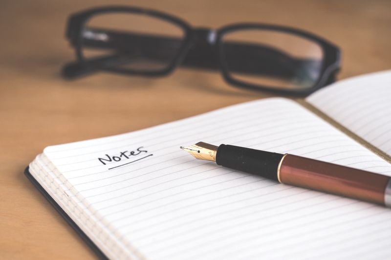 A test taker writes some notes for IELTS speaking questions.