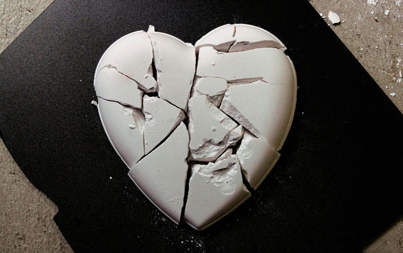 A shattered heart made of clay.