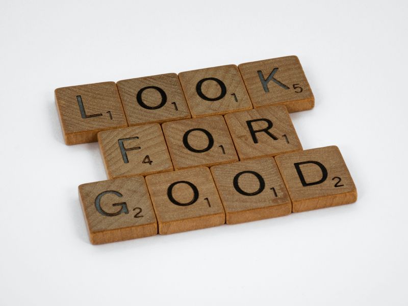 Scrabble tiles spelling out 'Look for good.'