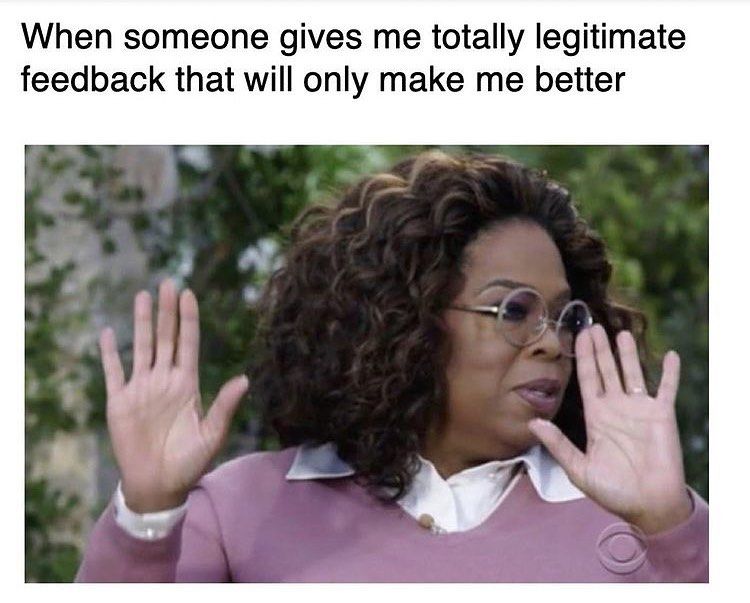 Oprah with hands raised, looking away with text that reads 'When someone gives me totally legitimate feedback.'