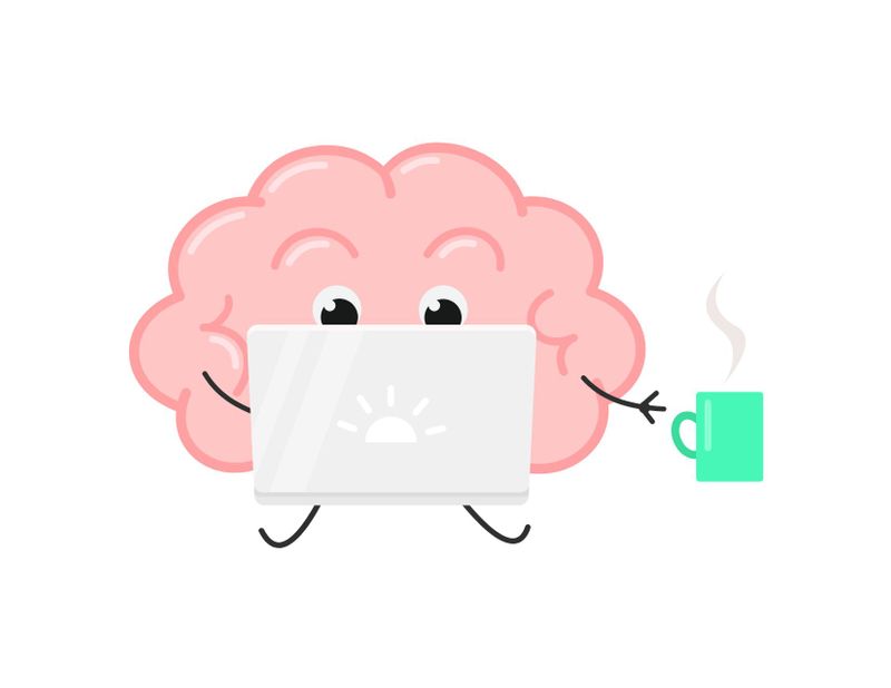 A cartoon brain sitting behind a computer, reaching for a cup with steam coming out the top.