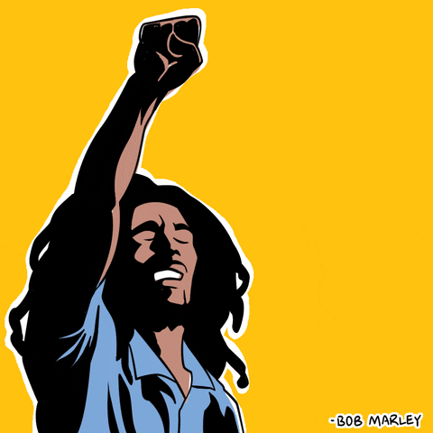 Bob Marley raising his fist over the text 