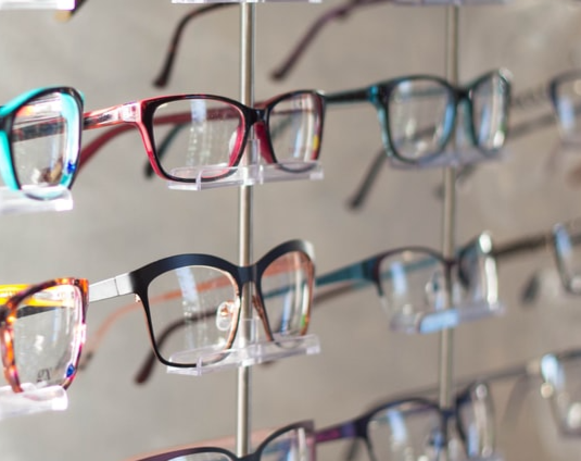 Glasses on a wall display in a store