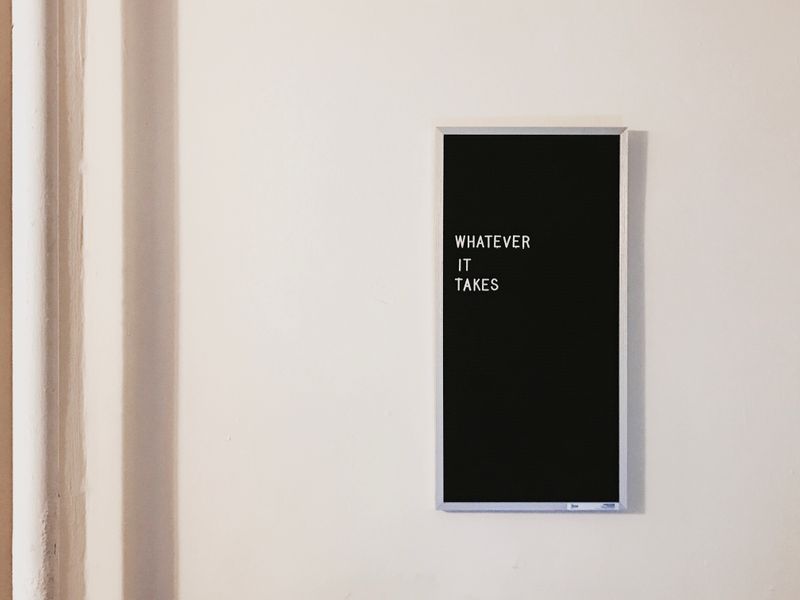 'Whatever it takes' written on a changeable letter board