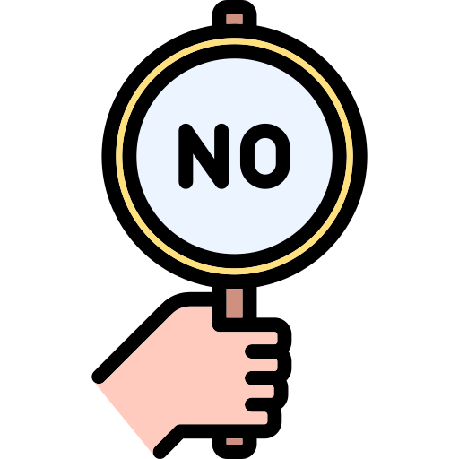 A hand holding up a sign saying "no".