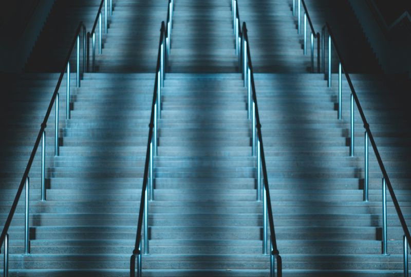 A large staircase in low light.