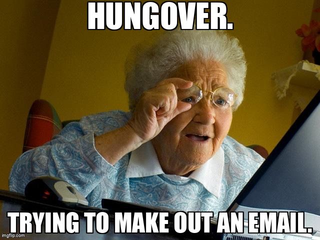 An elderly lady examining her laptop screen, holding her glasses to her face. Caption: Hungover. Trying to make out an email.