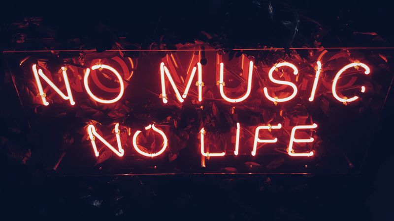 A neon sign that reads 'no music no life'