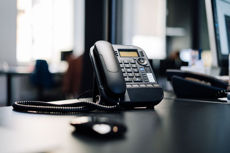 An office phone on a desk