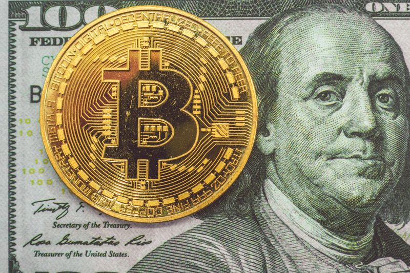 Bitcoin on a usd 100 dollar bill