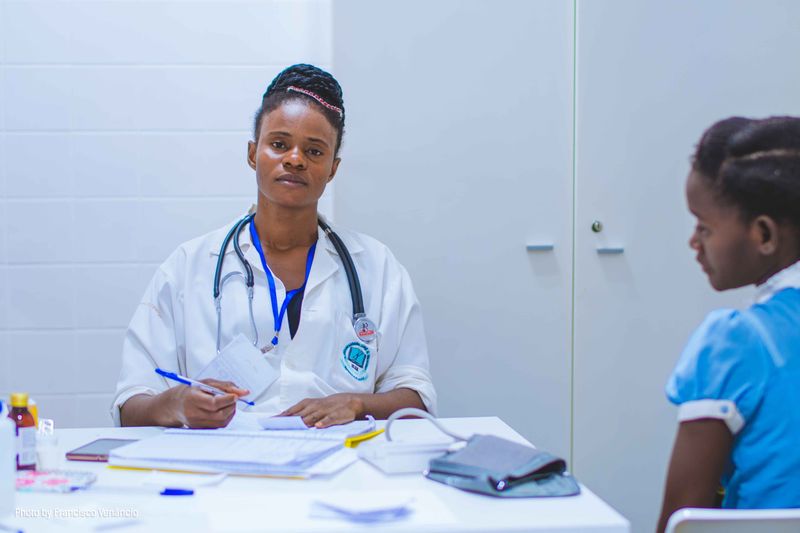 nurse taking patient's information