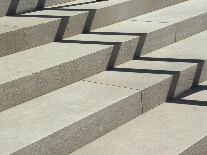 A staircase outdoors, with way lines moving up the steps