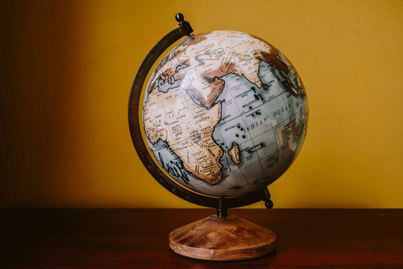 A globe on a desk.