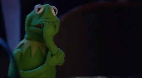 Kermit the Frog nervously bites his fingers.