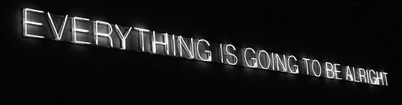 A neon sign that says, 