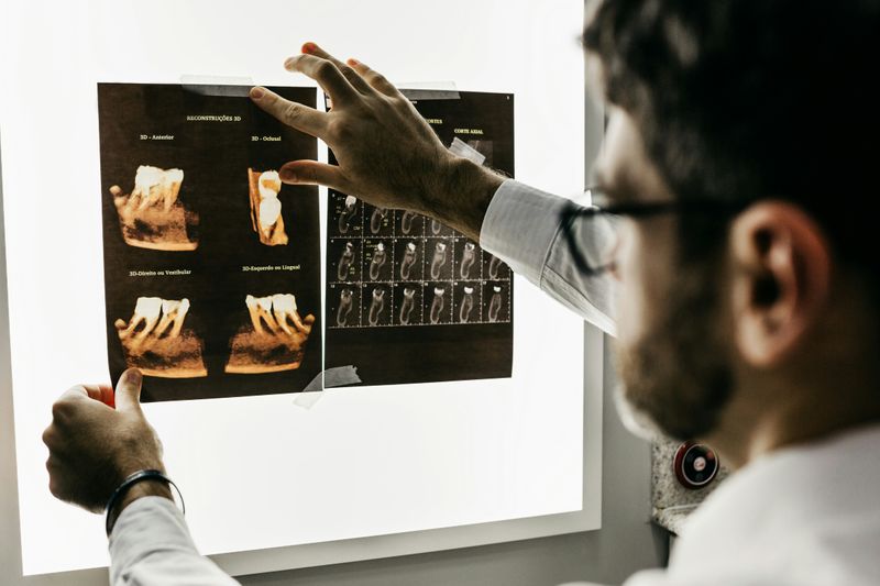A doctor looking at an x-ray.